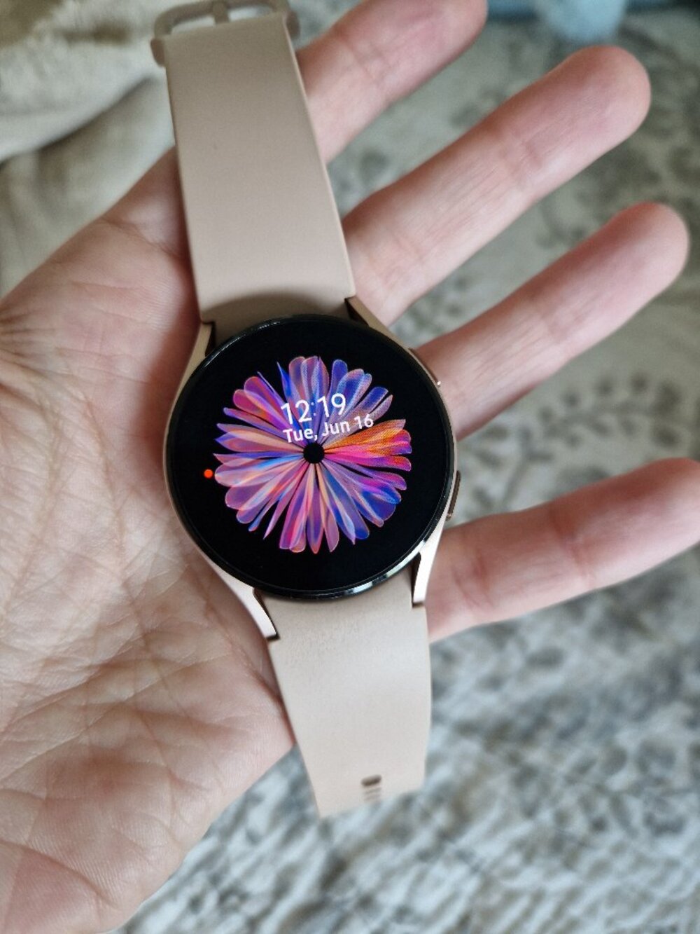 Samsung Galaxy Watch 4 with charging cable